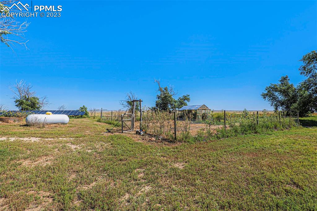 2905 Lauppe Road Yoder, CO 80864 - Photo 22 of 34 a view of a town with trees in the background