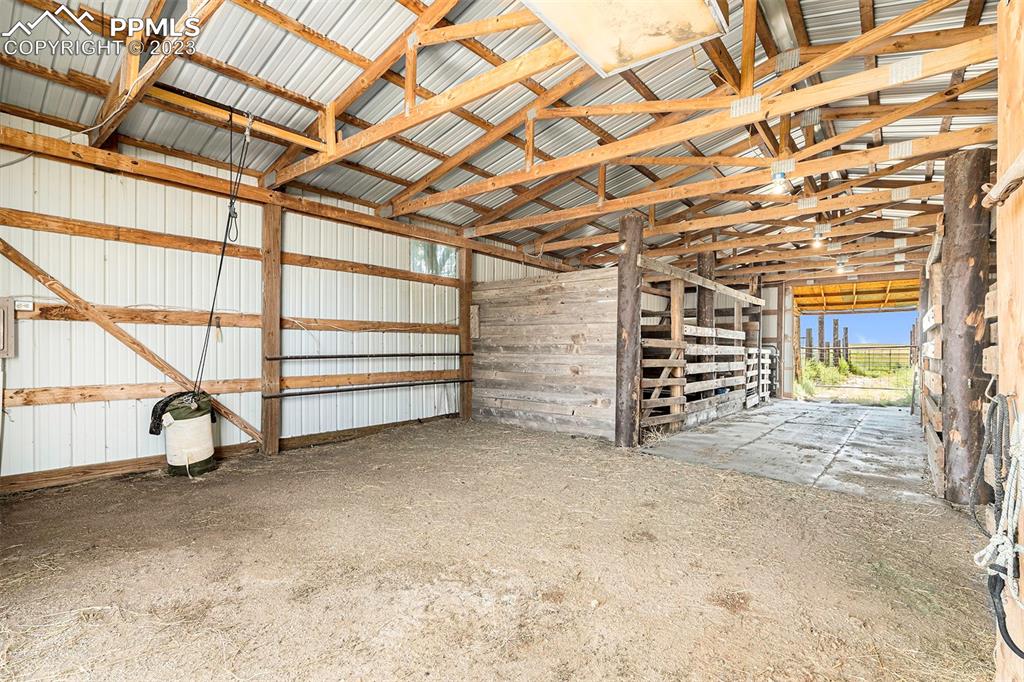 2905 Lauppe Road Yoder, CO 80864 - Photo 23 of 34 a view of an empty room with a staircase