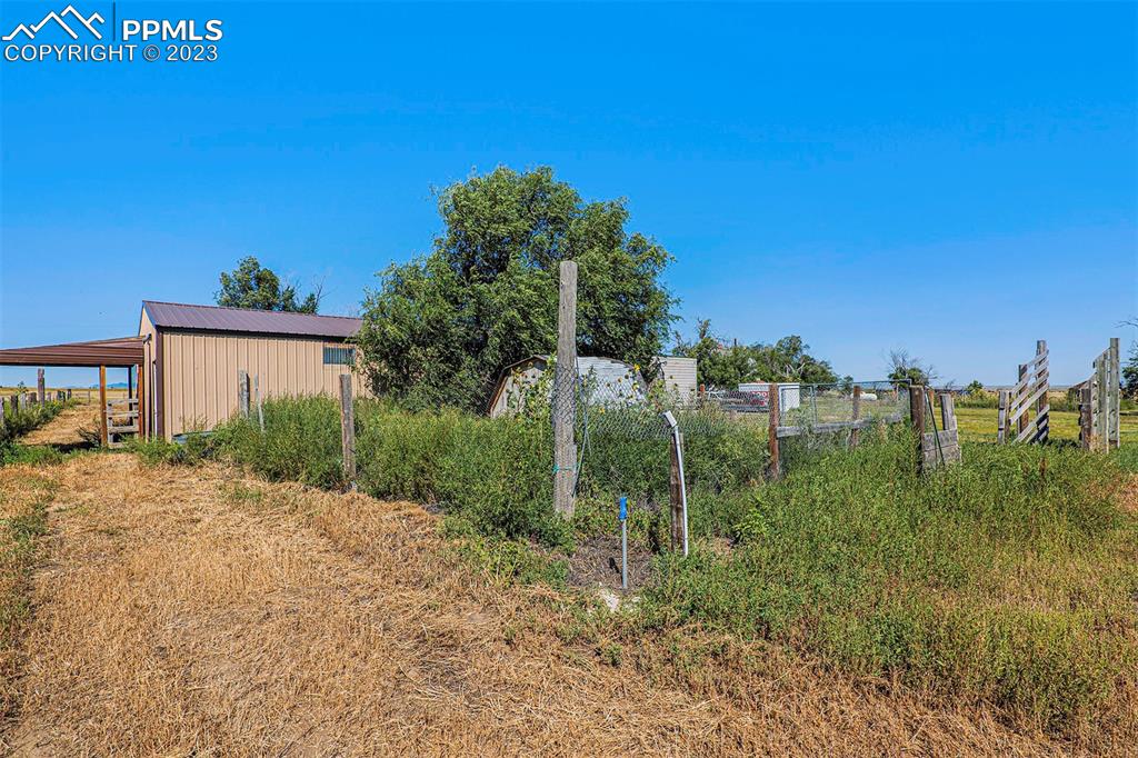 2905 Lauppe Road Yoder, CO 80864 - Photo 32 of 34 a view of a backyard