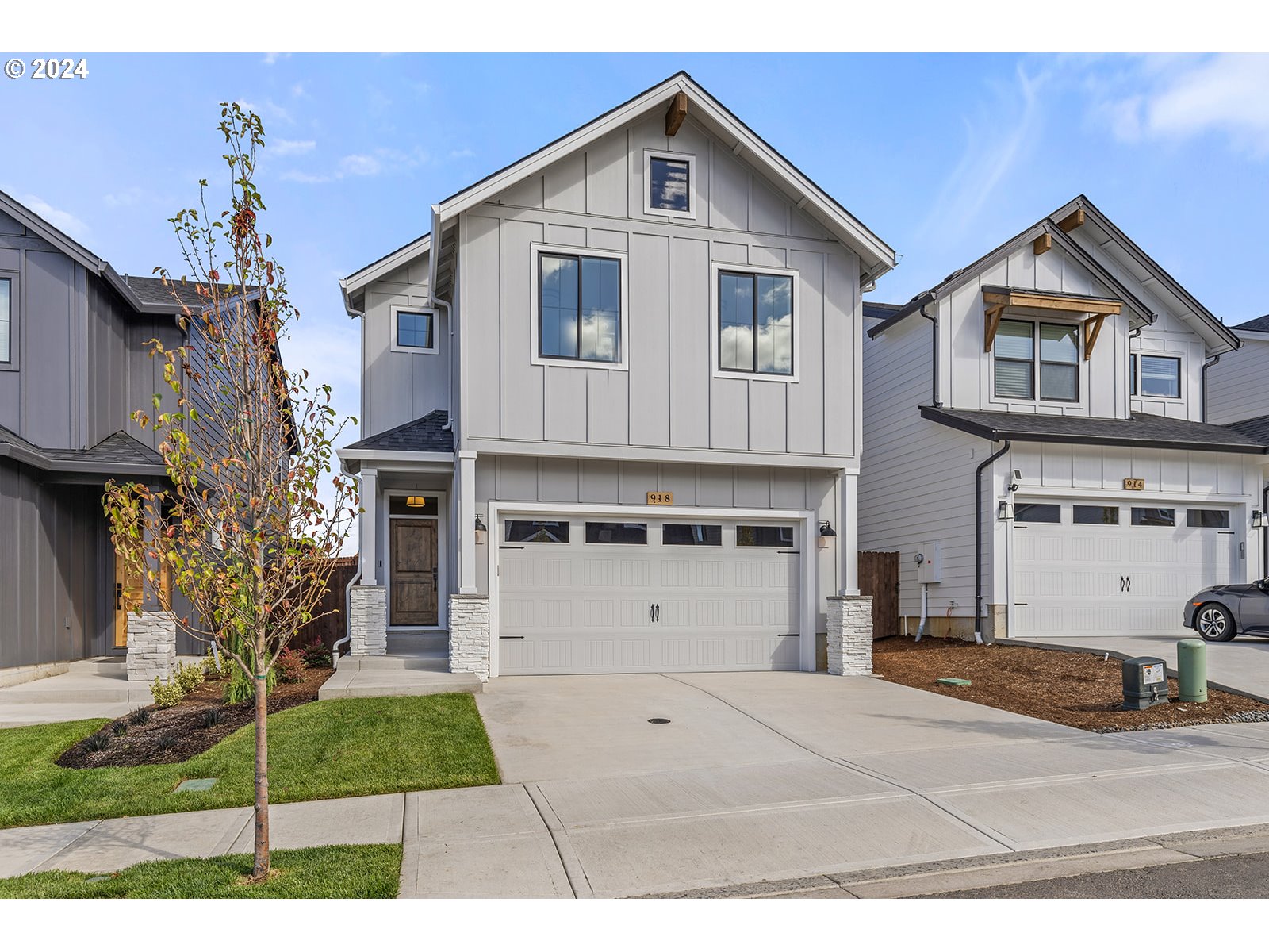 918 Northwest 178th Street Ridgefield, WA 98642 - Photo 2 of 47 a view of a house with a yard