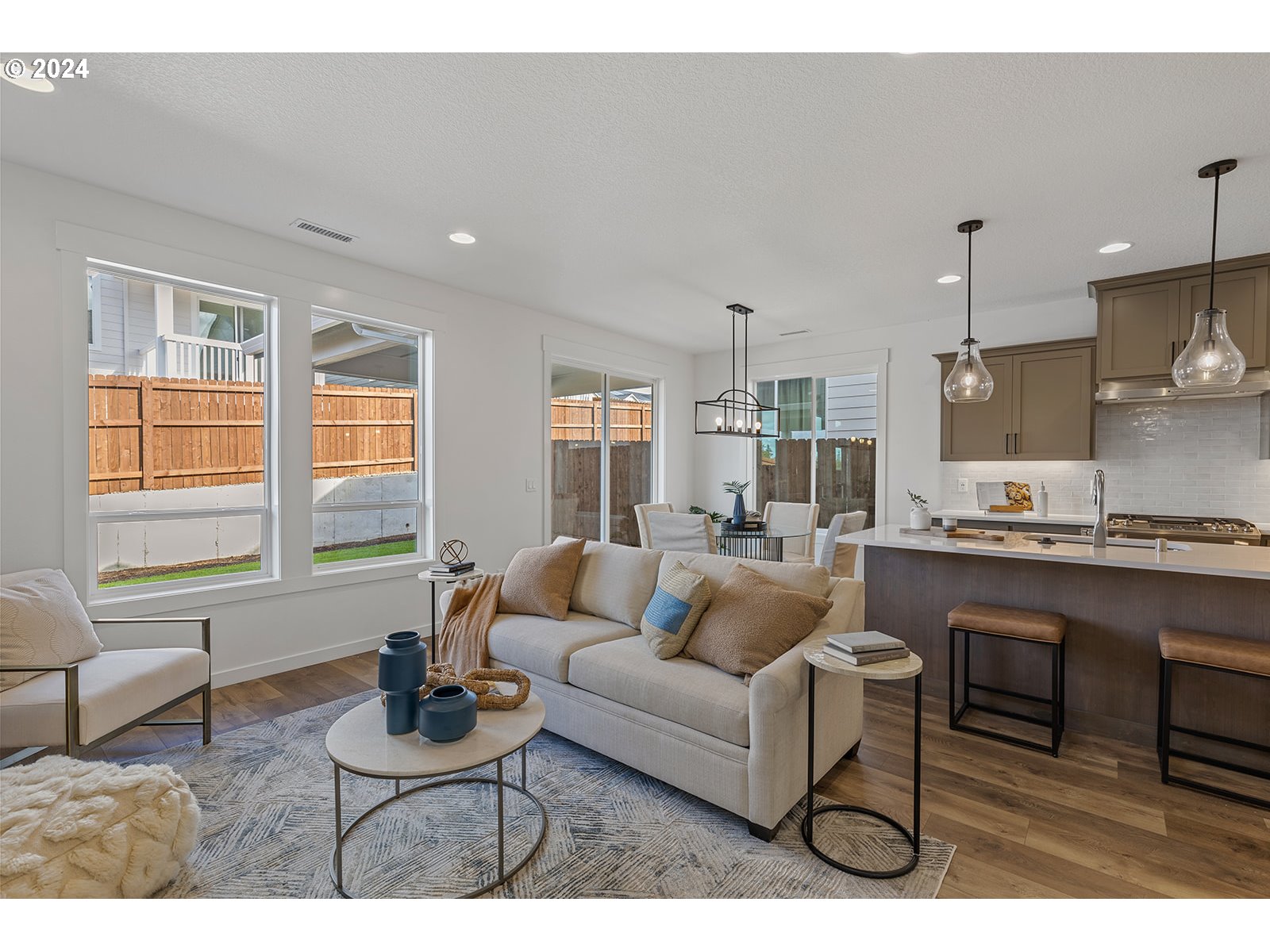 918 Northwest 178th Street Ridgefield, WA 98642 - Photo 29 of 47 a living room with furniture and a large window