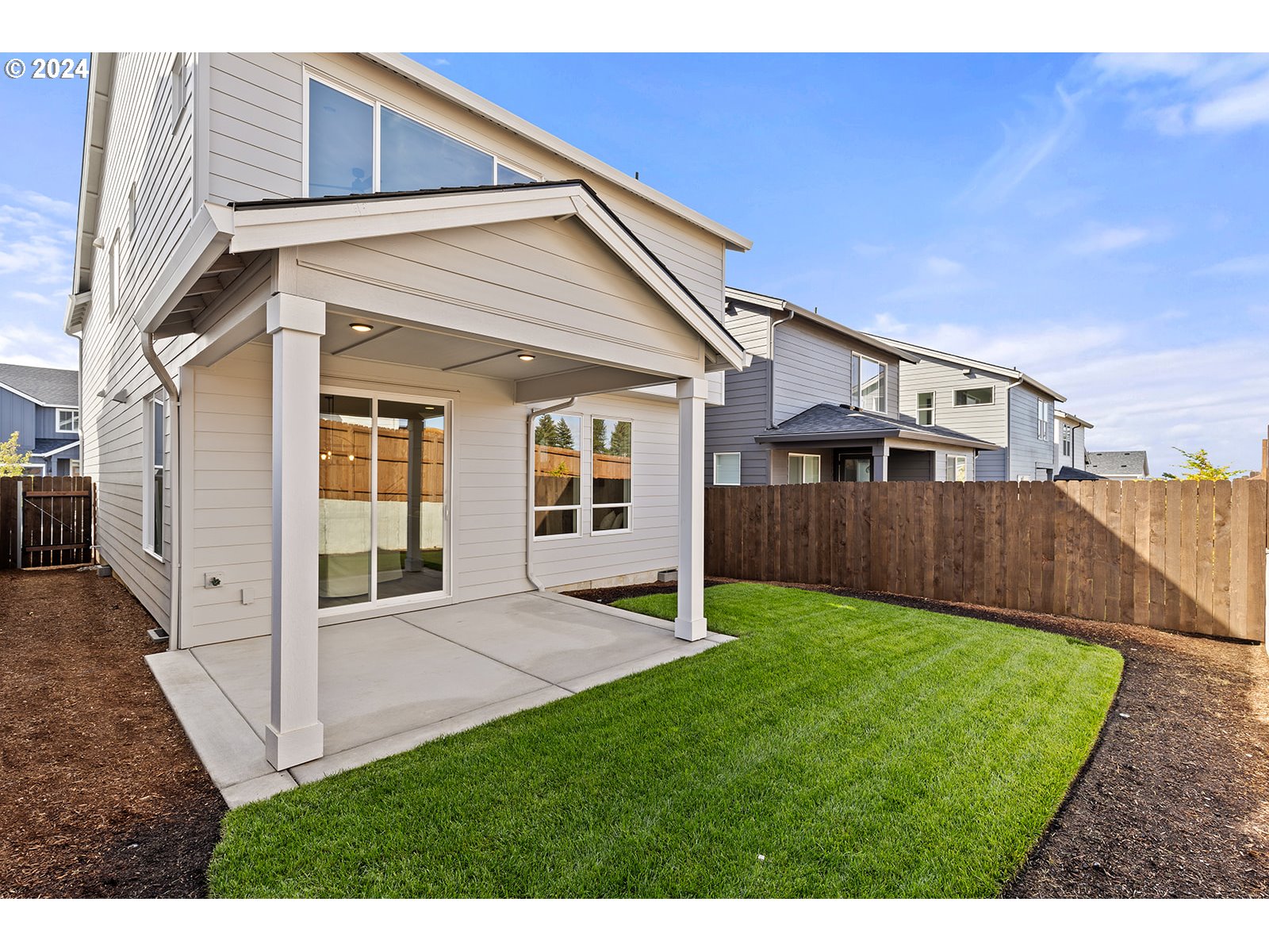 918 Northwest 178th Street Ridgefield, WA 98642 - Photo 31 of 47 a view of an house with backyard and sitting area