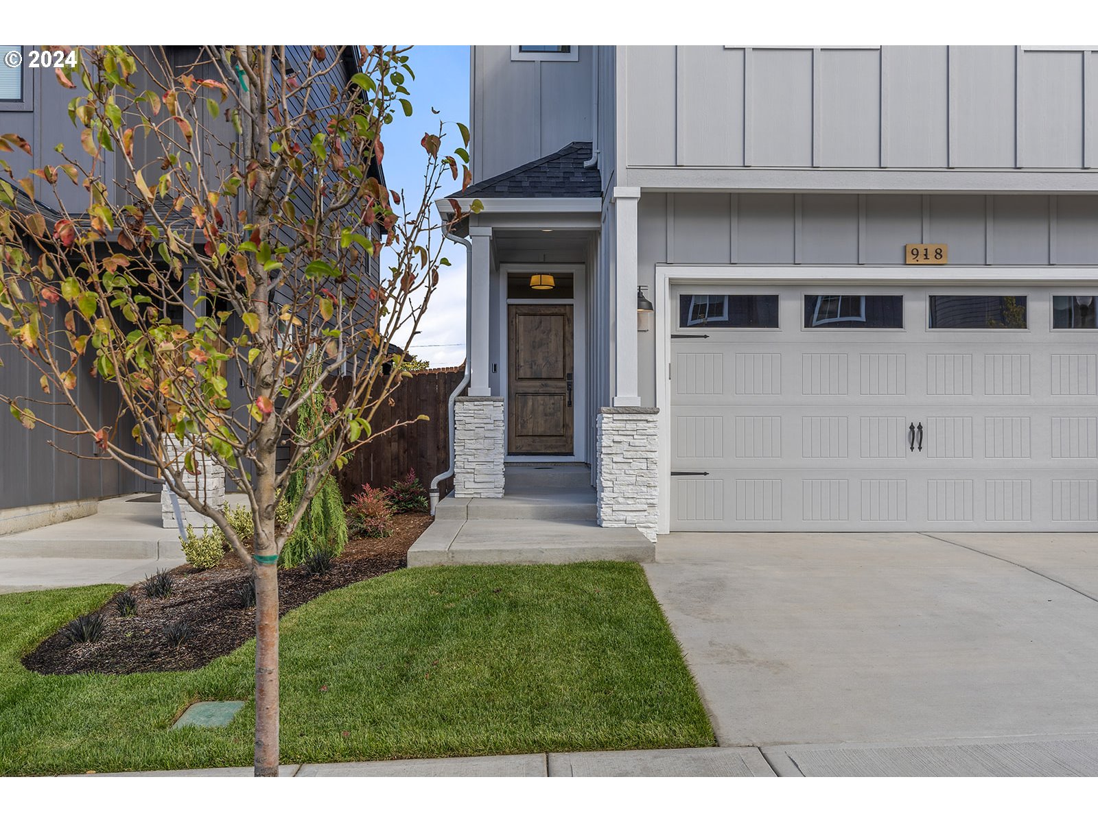 918 Northwest 178th Street Ridgefield, WA 98642 - Photo 5 of 47 a view of a house with a yard