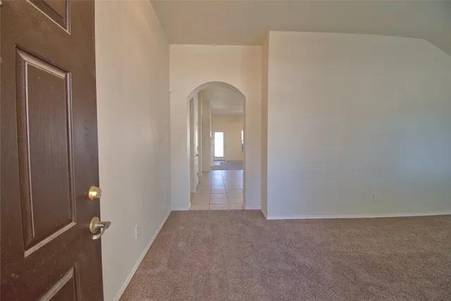 a view of a room that has a large window