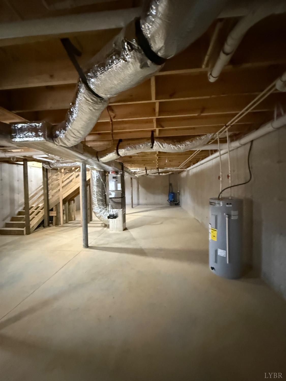 4103 Hog Wallow Road Nathalie, VA 24577 - Photo 17 of 20 a view of empty room with wooden walls