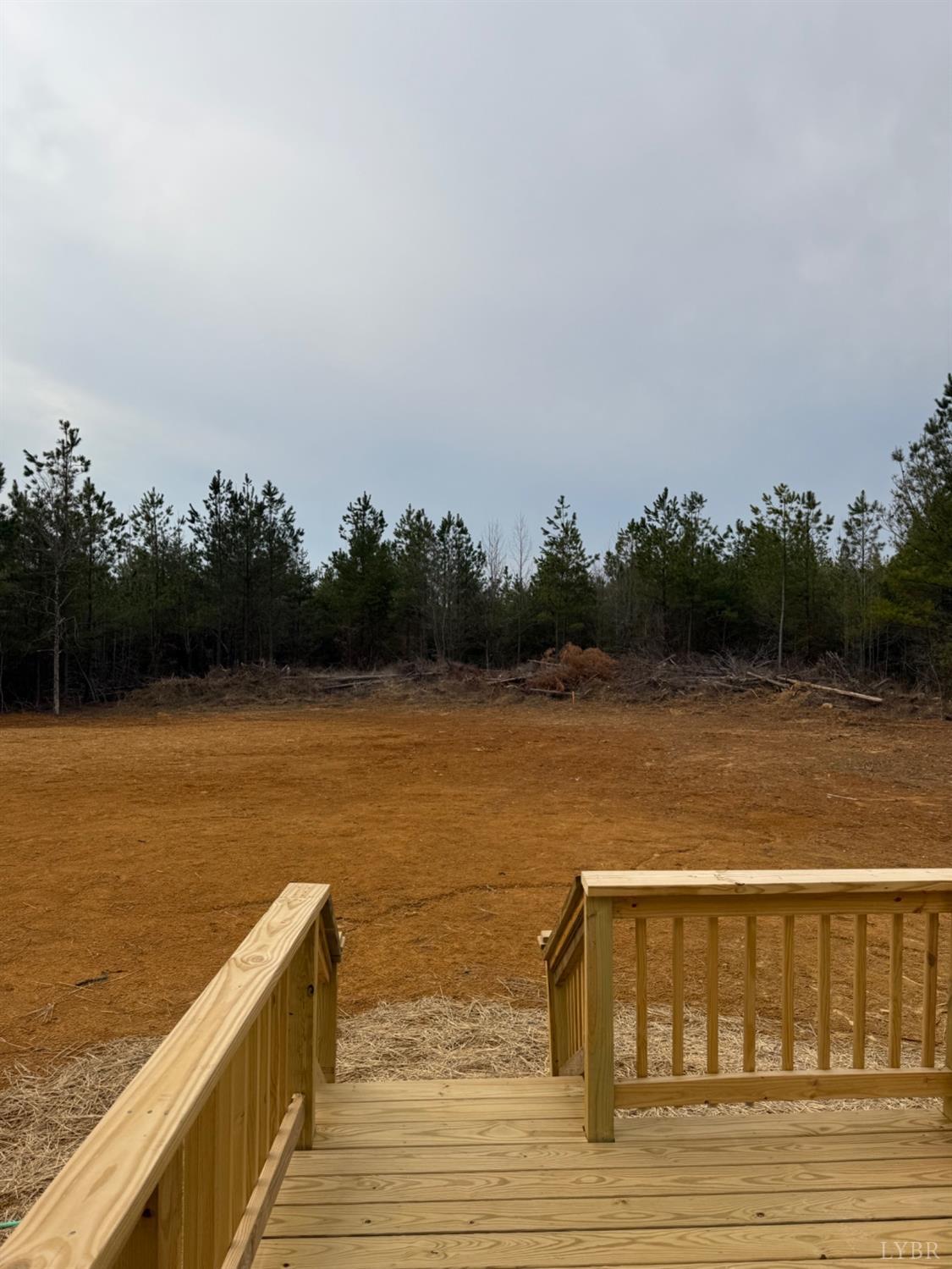4103 Hog Wallow Road Nathalie, VA 24577 - Photo 19 of 20 a view of swimming pool with seating area and lake view