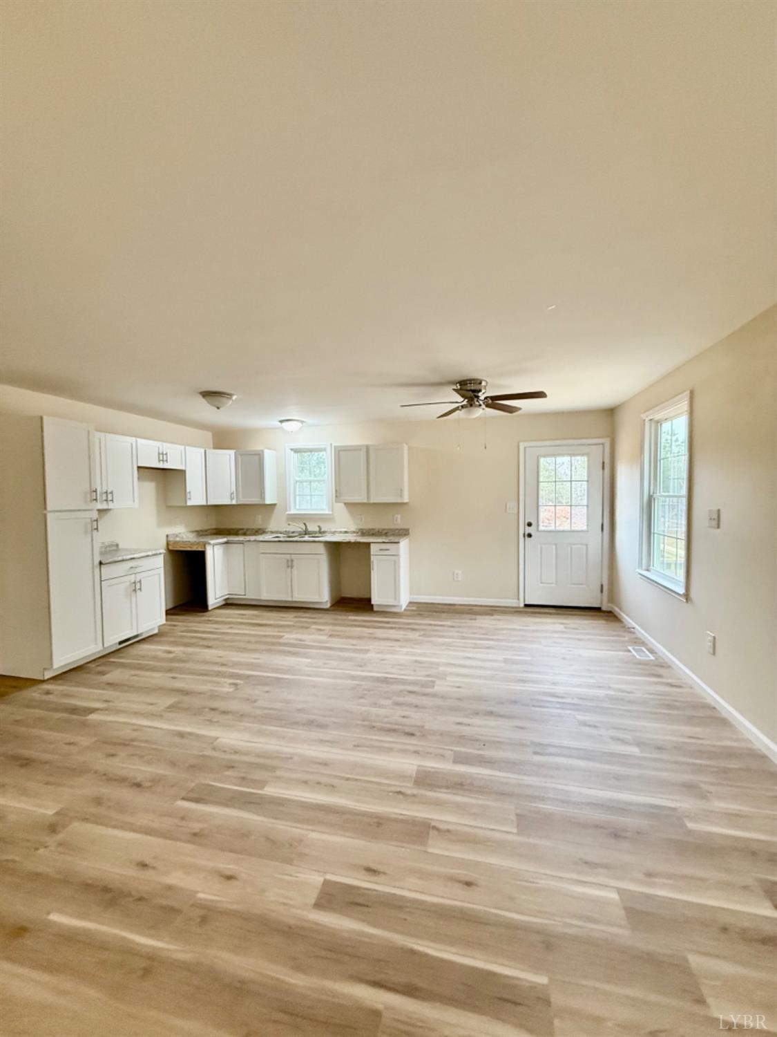 4103 Hog Wallow Road Nathalie, VA 24577 - Photo 5 of 20 a view of empty room with wooden floor
