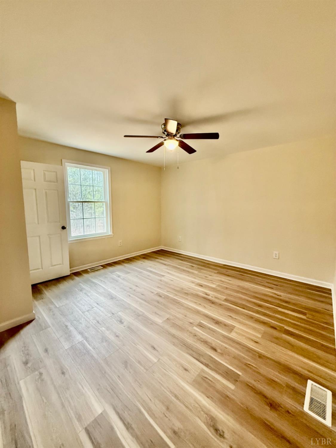 4103 Hog Wallow Road Nathalie, VA 24577 - Photo 7 of 20 wooden floor in an empty room