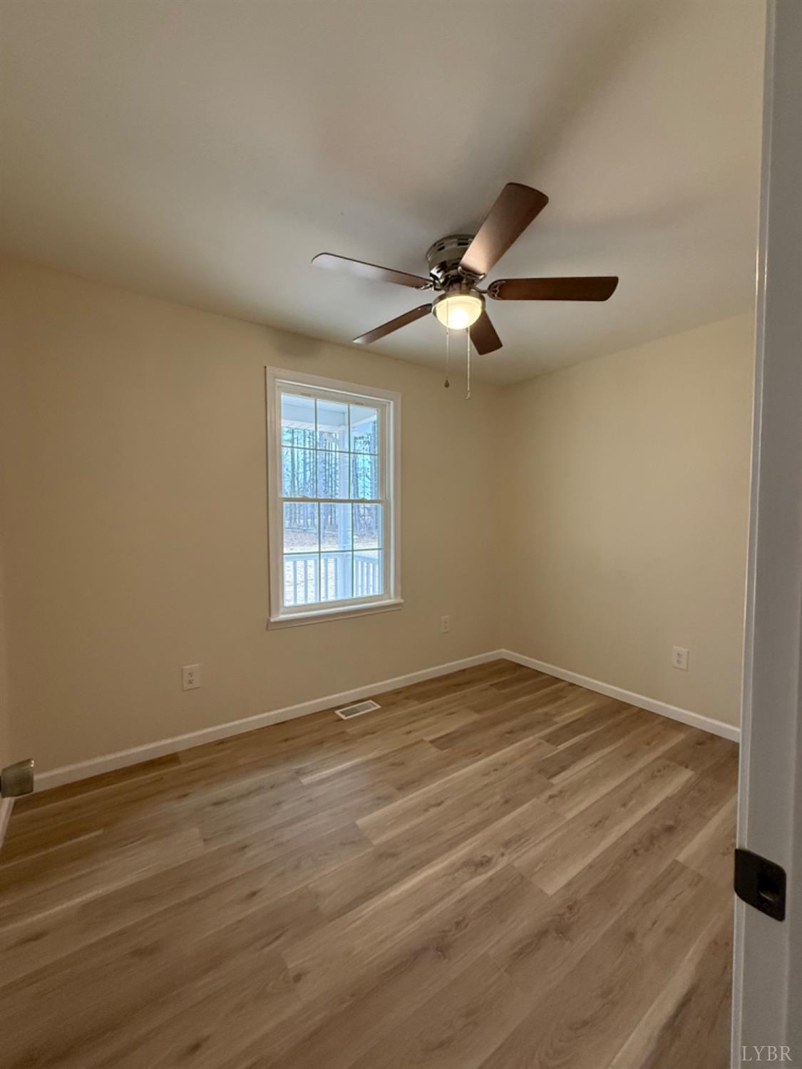 4103 Hog Wallow Road Nathalie, VA 24577 - Photo 10 of 20 a view of an empty room with a window