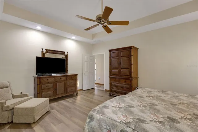 a bedroom with a bed and furniture