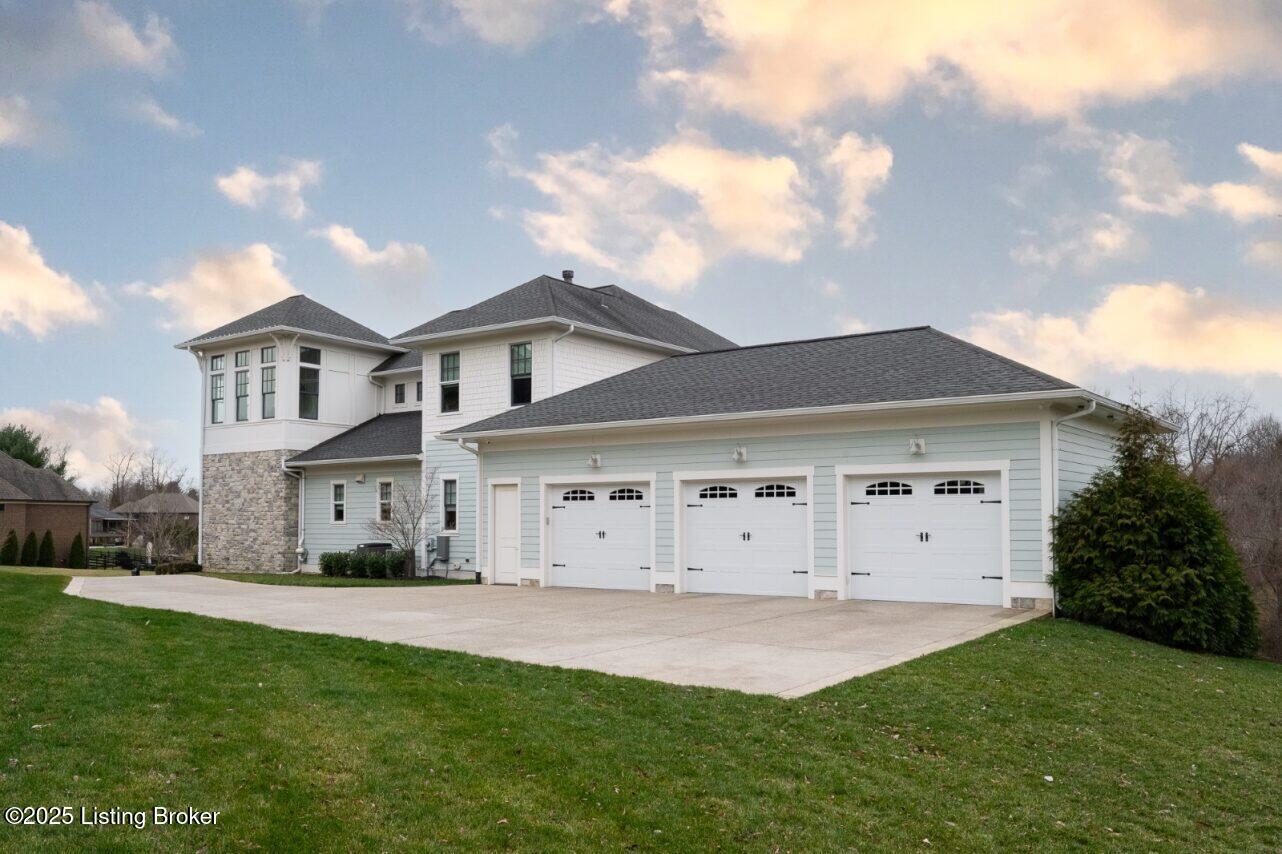 8222 Spring Glade Place Prospect, KY 40059 - Photo 3 of 3 Driveway Garages