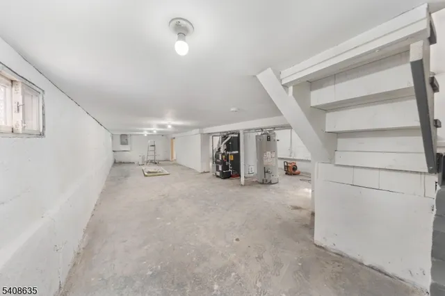 a view of empty room with stairs