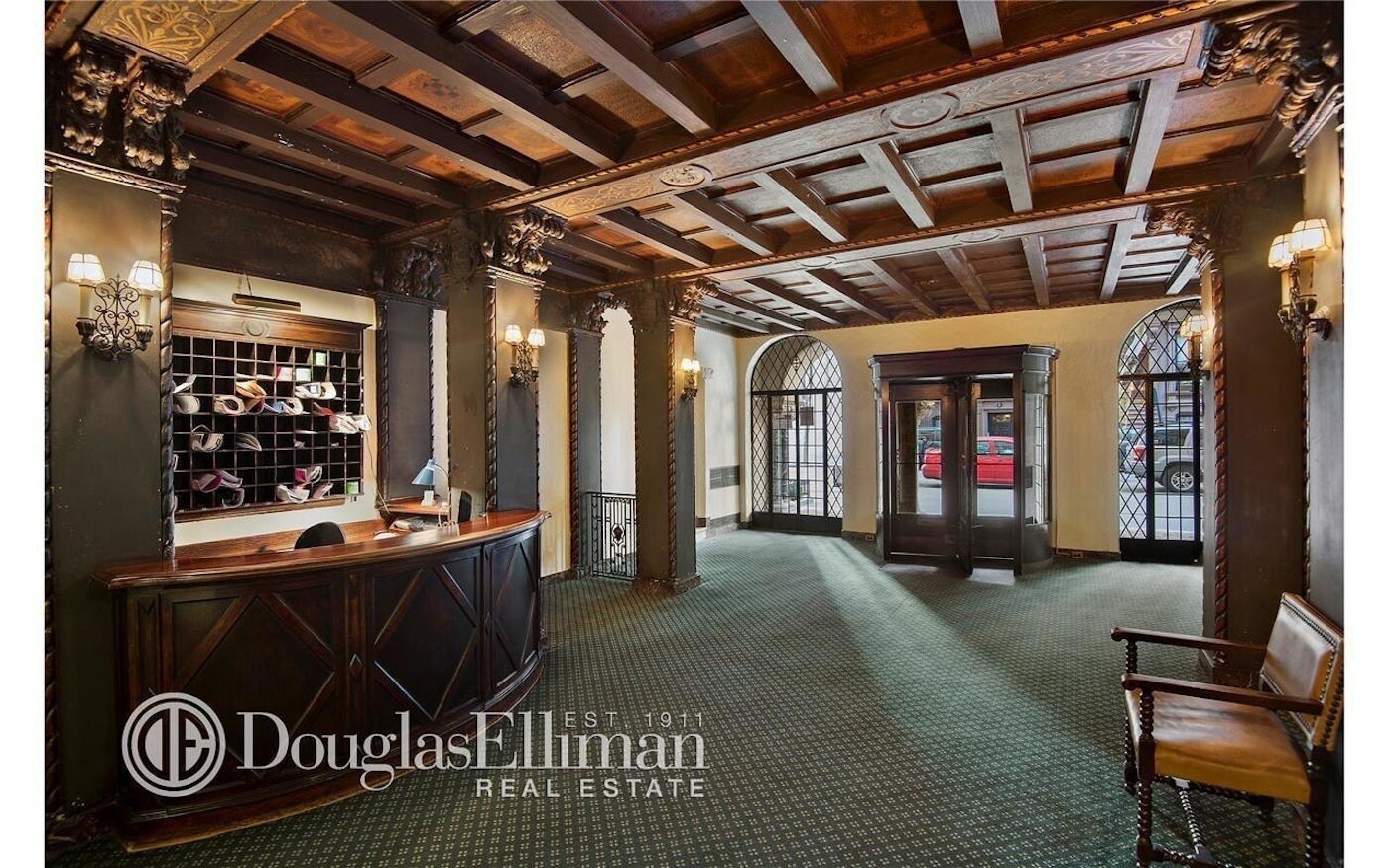 70 Remsen Street, Unit 7H Brooklyn, NY 11201 - Photo 11 of 13 a front view of a building with seating space