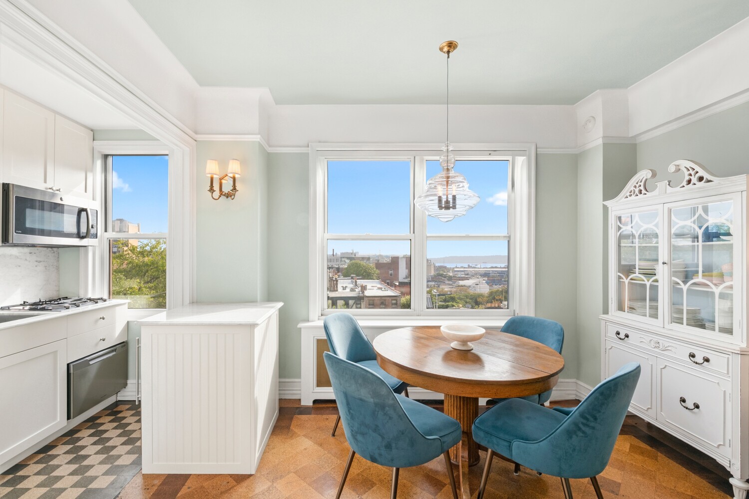 70 Remsen Street, Unit 7H Brooklyn, NY 11201 - Photo 2 of 13 a dining room with furniture a chandelier and wooden floor