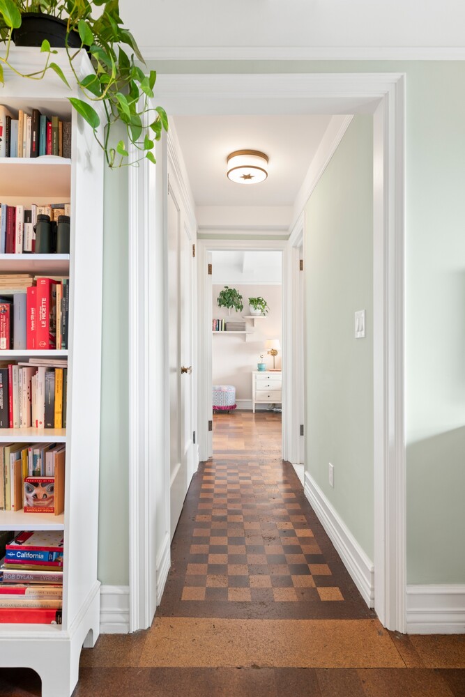 70 Remsen Street, Unit 7H Brooklyn, NY 11201 - Photo 7 of 13 a view of a hallway with closet and wooden floor