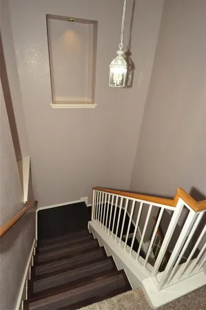 a bathroom with a sink and shower