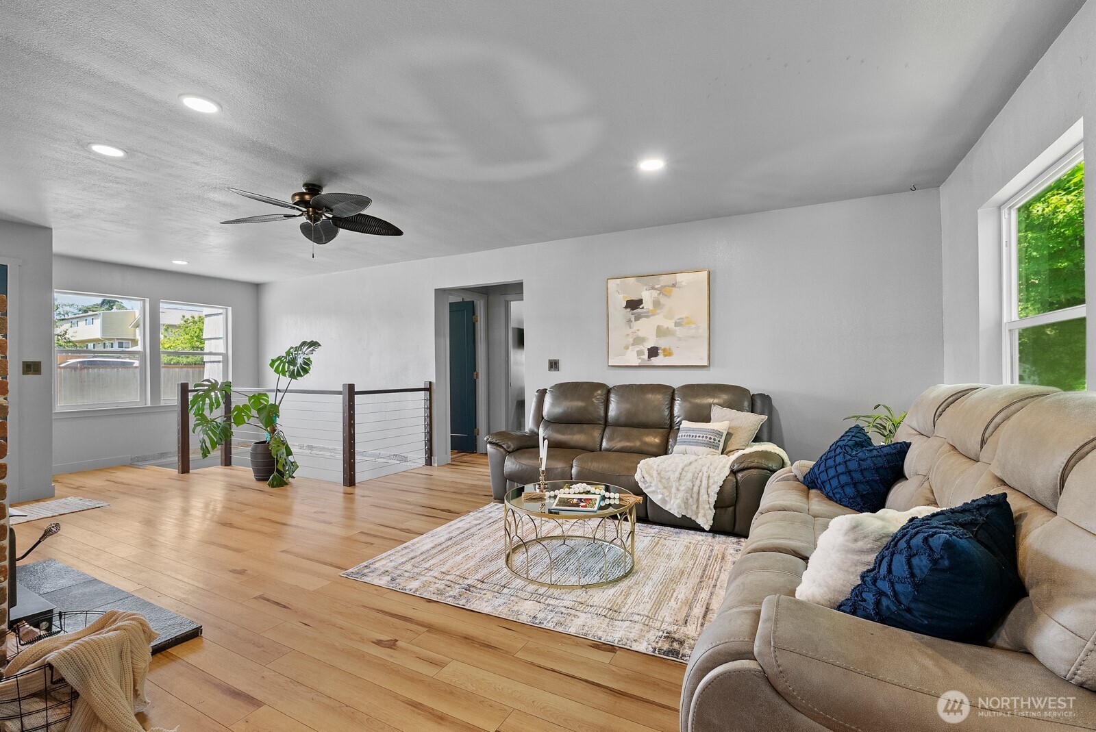 307 4th Street Steilacoom, WA 98388 - Photo 10 of 39 a living room with furniture and a wooden floor