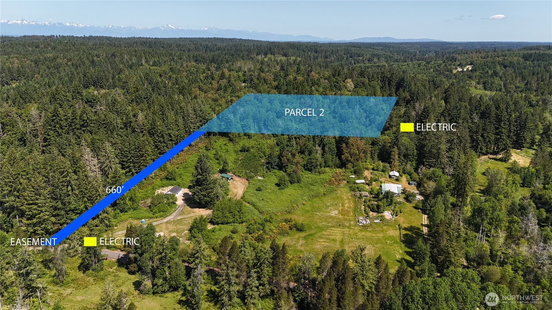 18771 Erickson Road Southwest Longbranch, WA 98349 - Photo 2 of 9 a view of a house with a yard and lake view