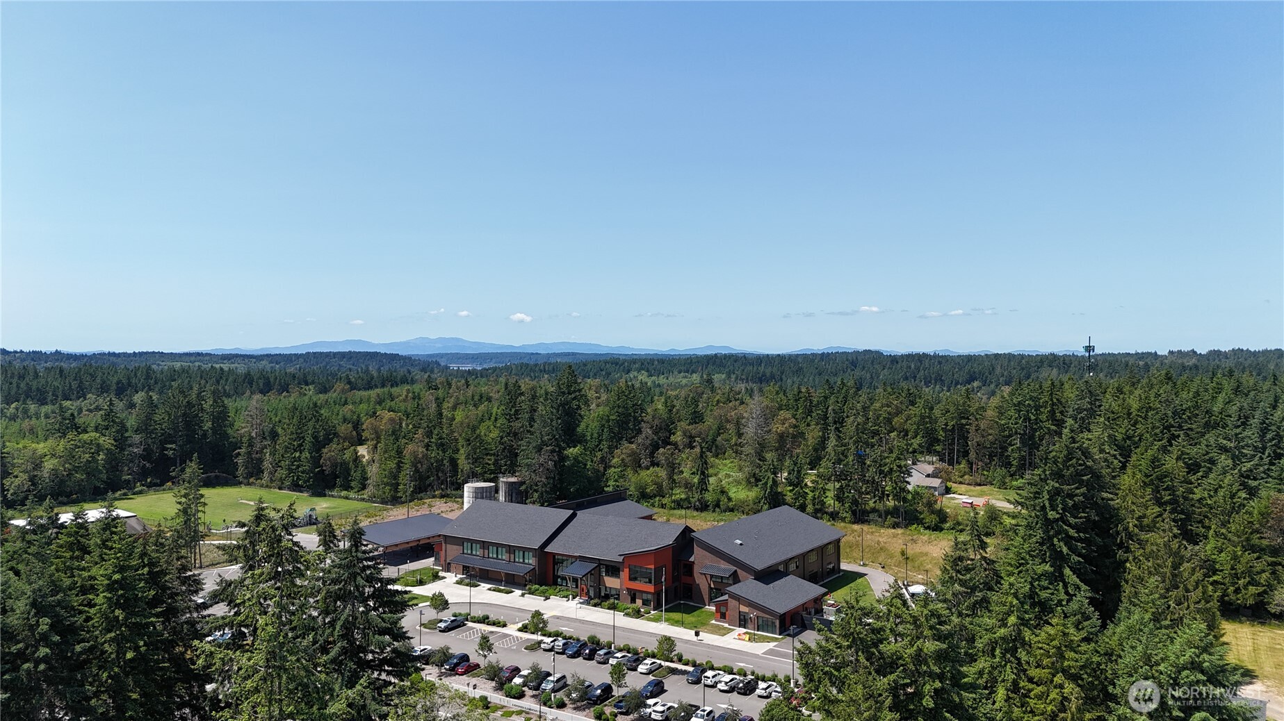 18771 Erickson Road Southwest Longbranch, WA 98349 - Photo 7 of 9 a view of a lake with houses in back