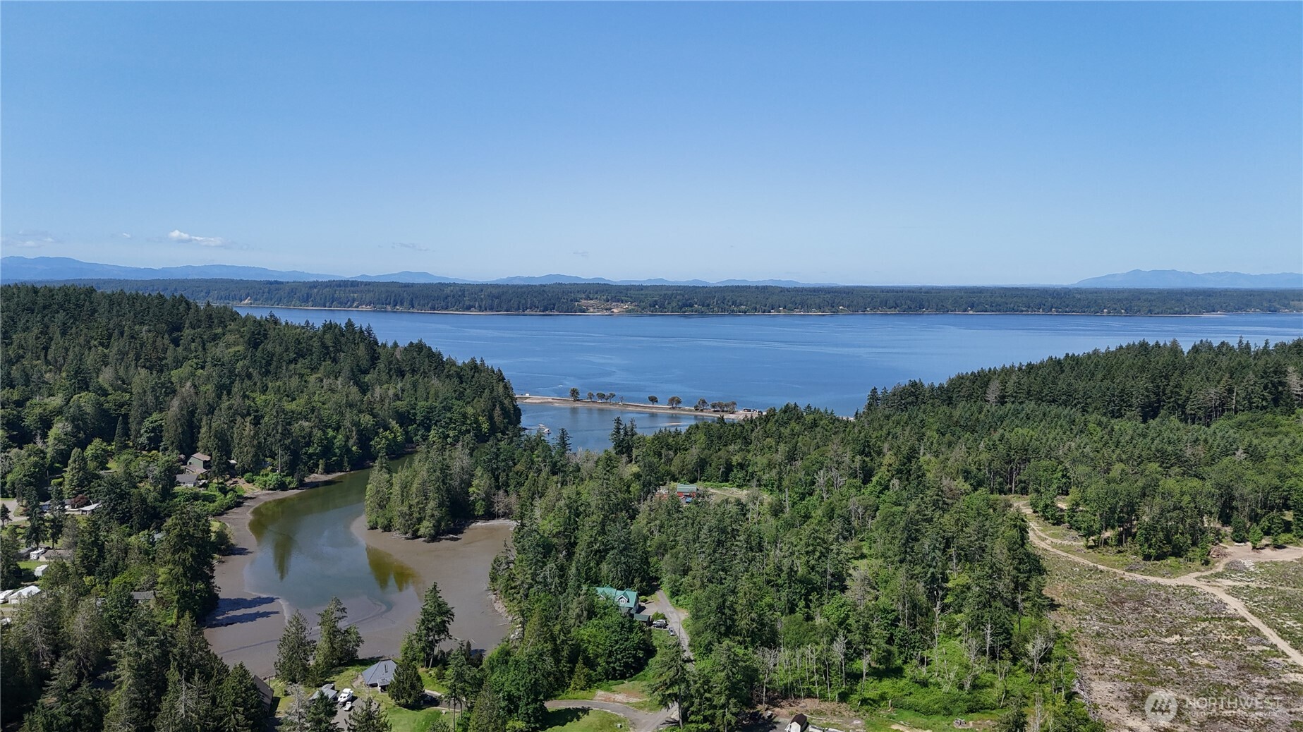 18771 Erickson Road Southwest Longbranch, WA 98349 - Photo 9 of 9 an aerial view of a house with a garden