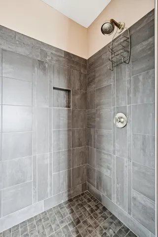 a living room with furniture wooden floor and a chandelier