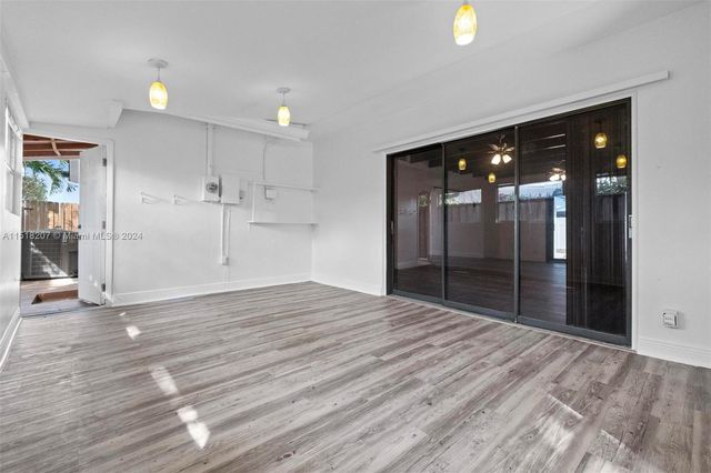 a view of a house with wooden floor