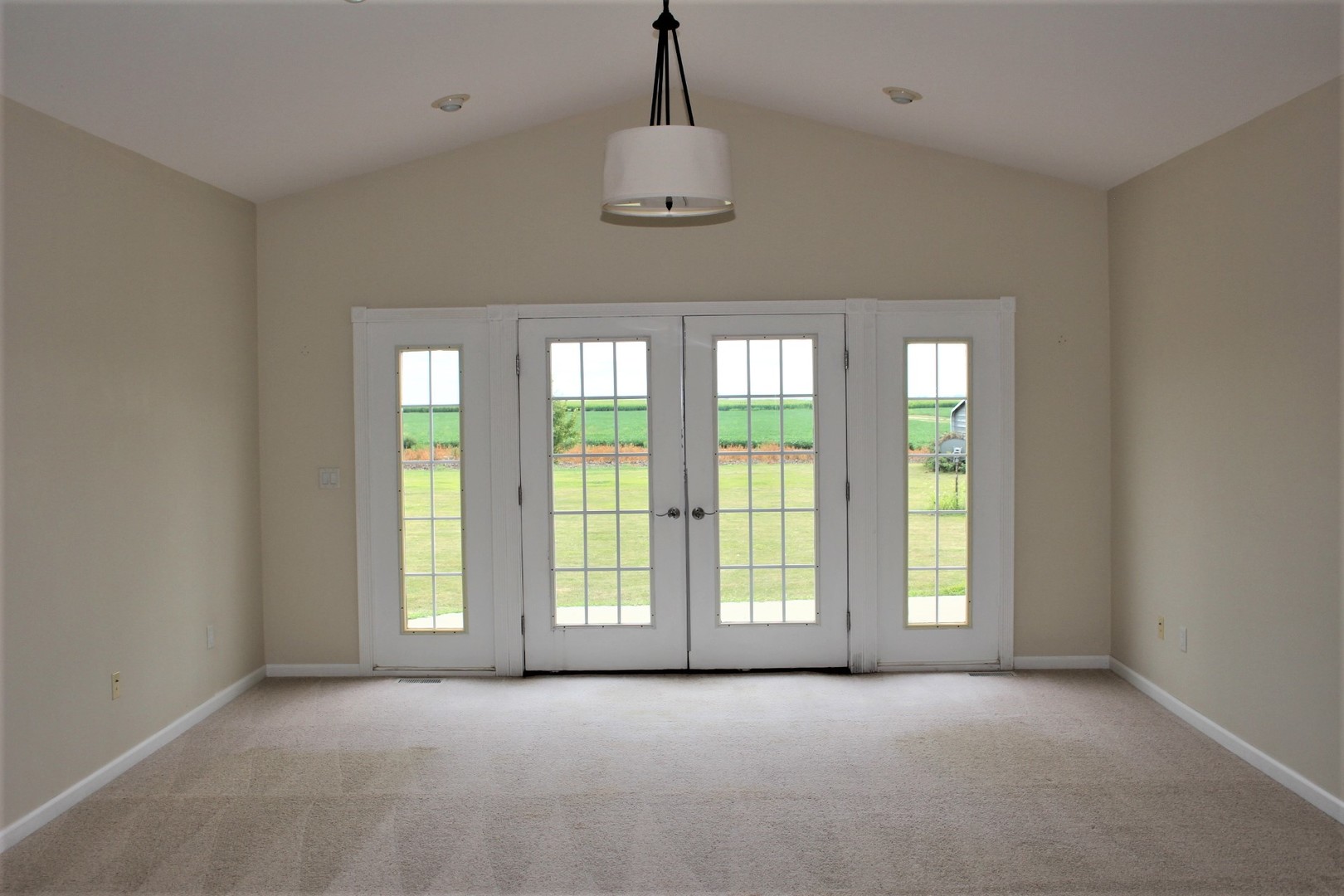 3978 Connors Road Clinton, IL 61727 - Photo 11 of 34 a view of an empty room with a window