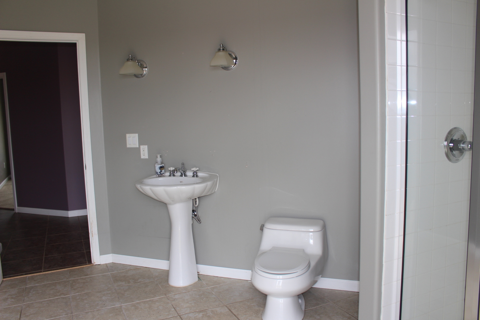 3978 Connors Road Clinton, IL 61727 - Photo 16 of 34 a bathroom with a sink toilet and a mirror