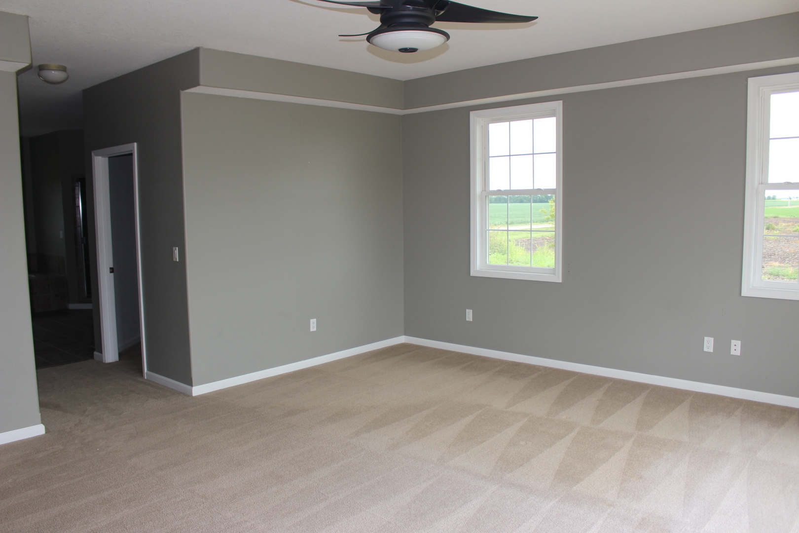 3978 Connors Road Clinton, IL 61727 - Photo 18 of 34 a view of an empty room with a window