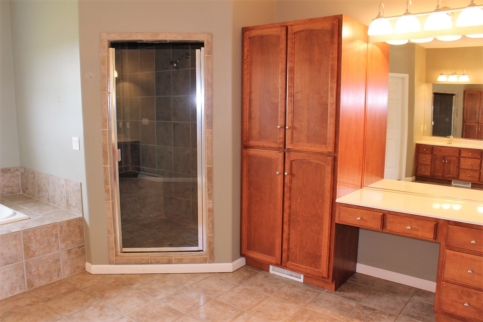 3978 Connors Road Clinton, IL 61727 - Photo 20 of 34 a bathroom with a sink and a mirror