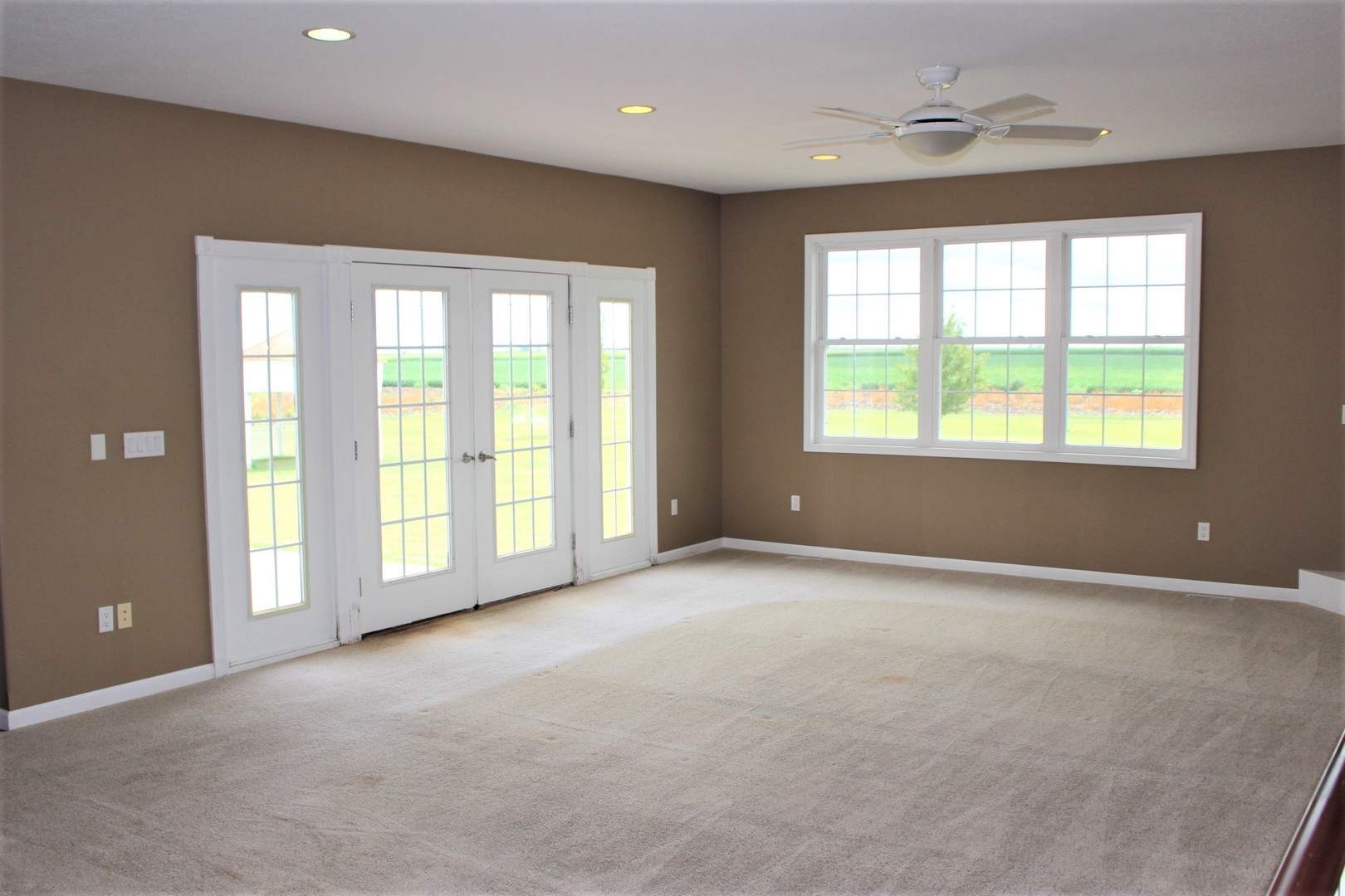 3978 Connors Road Clinton, IL 61727 - Photo 8 of 34 a view of an empty room with a window