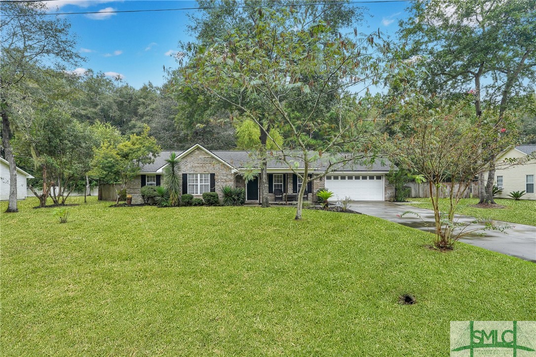 303 Plantation Drive Rincon, GA 31326 - Photo 2 of 28 Beautiful brick exterior