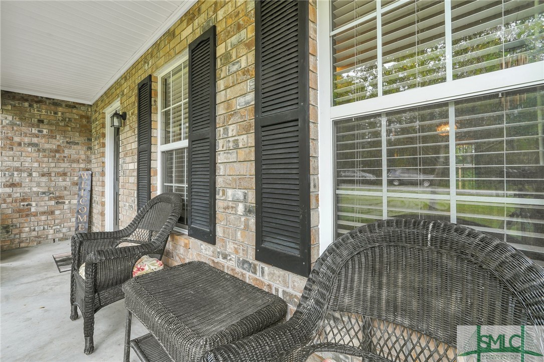 303 Plantation Drive Rincon, GA 31326 - Photo 4 of 28 Covered front porch
