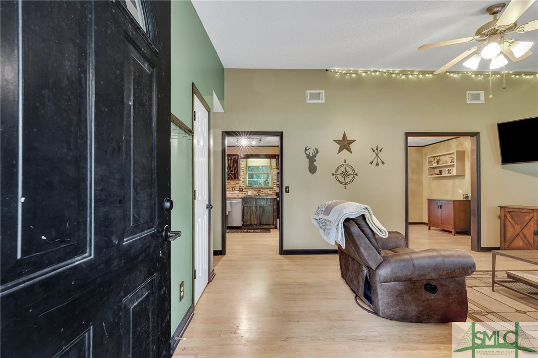 303 Plantation Drive Rincon, GA 31326 - Photo 6 of 28 Opens into the living room