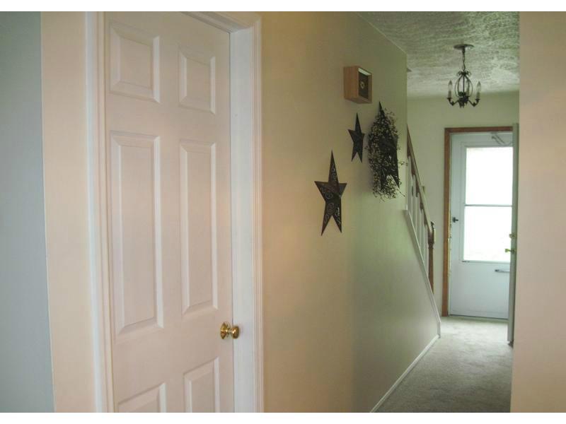 223 B Stone Quarry Road Monaca, PA 15061 - Photo 11 of 19 Entry/Foyer. The left door leads to the laundry, storage and garage.