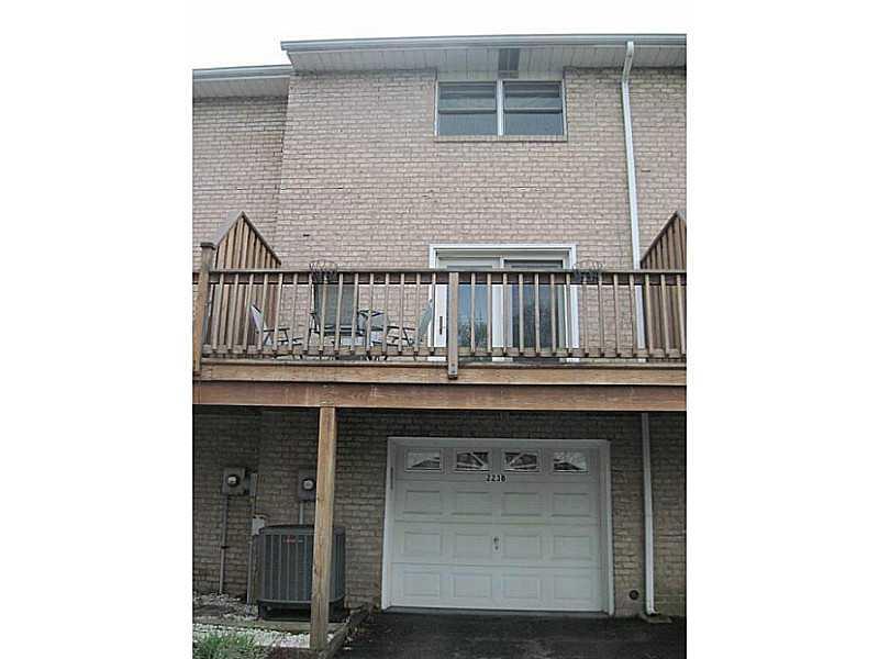 223 B Stone Quarry Road Monaca, PA 15061 - Photo 16 of 19 Exterior Back. One car garage. The air conditioner is newer.