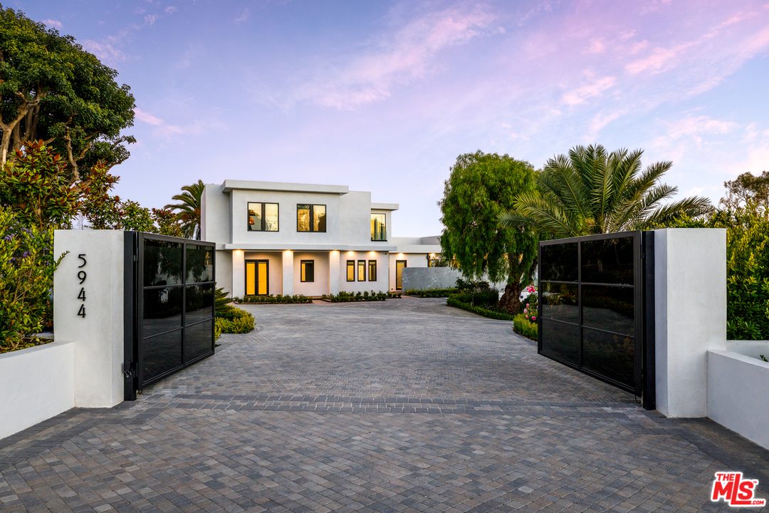 5944 Filaree Heights Road Malibu, CA 90265 - Photo 2 of 33 a view of a house with a backyard and a garage