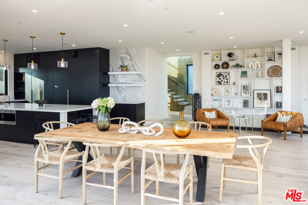 5944 Filaree Heights Road Malibu, CA 90265 - Photo 12 of 33 a view of a dining room with furniture and a table
