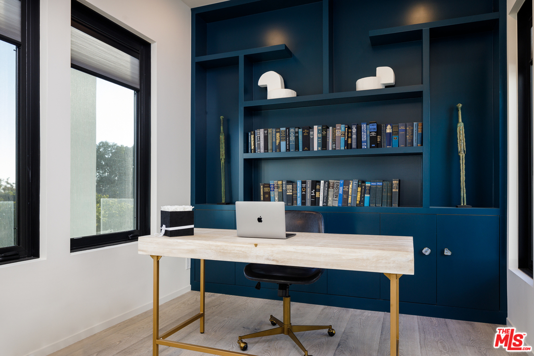 5944 Filaree Heights Road Malibu, CA 90265 - Photo 13 of 33 a view of a dining room with furniture and a floor to ceiling window