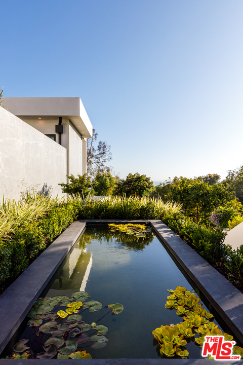 5944 Filaree Heights Road Malibu, CA 90265 - Photo 3 of 33 a view of a lake with a house in the background