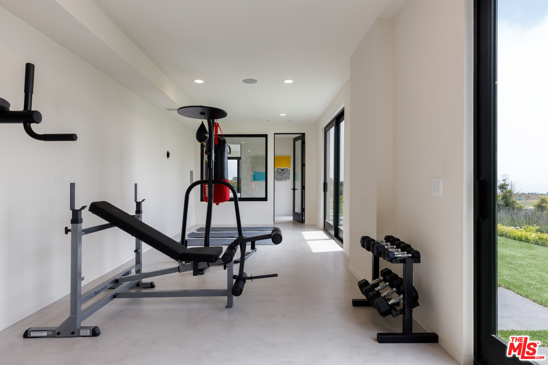 5944 Filaree Heights Road Malibu, CA 90265 - Photo 27 of 33 a view of a room with gym equipment
