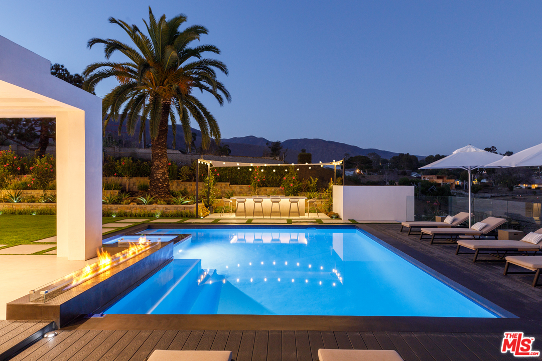 5944 Filaree Heights Road Malibu, CA 90265 - Photo 31 of 33 a view of swimming pool with seating area and furniture
