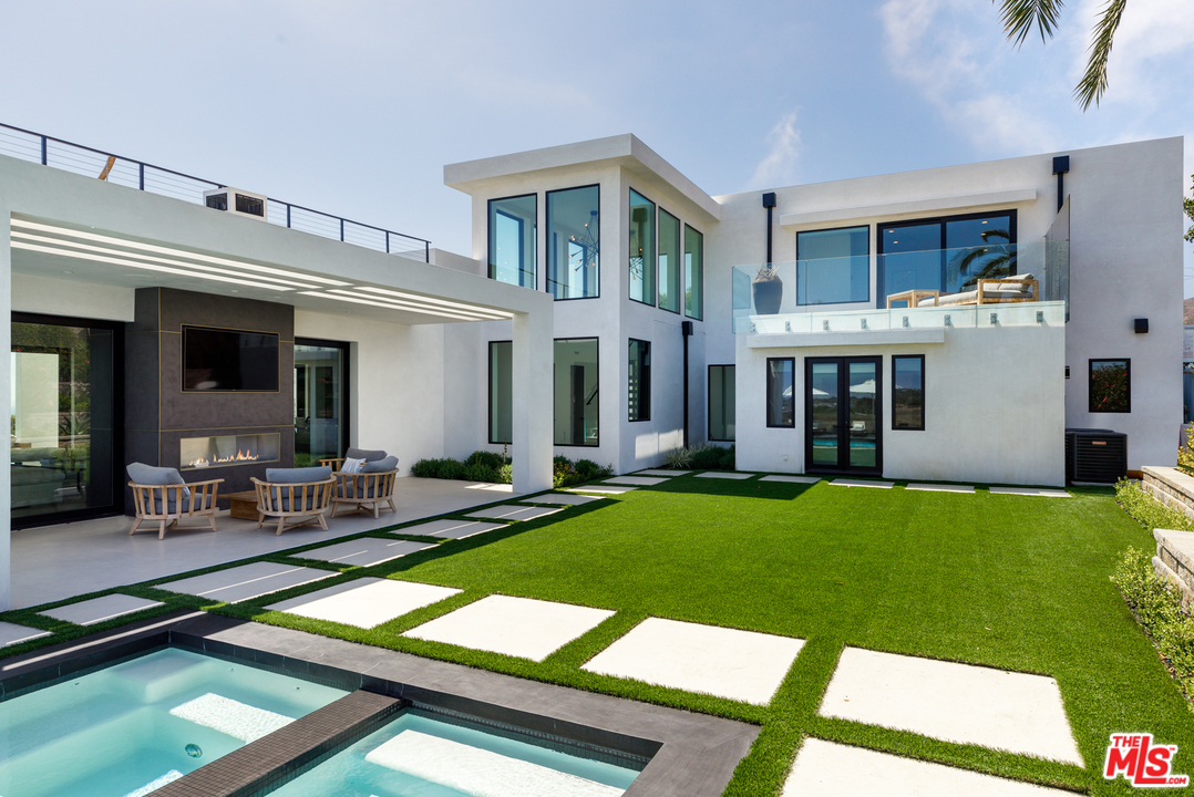 5944 Filaree Heights Road Malibu, CA 90265 - Photo 32 of 33 a view of a house with swimming pool and sitting area
