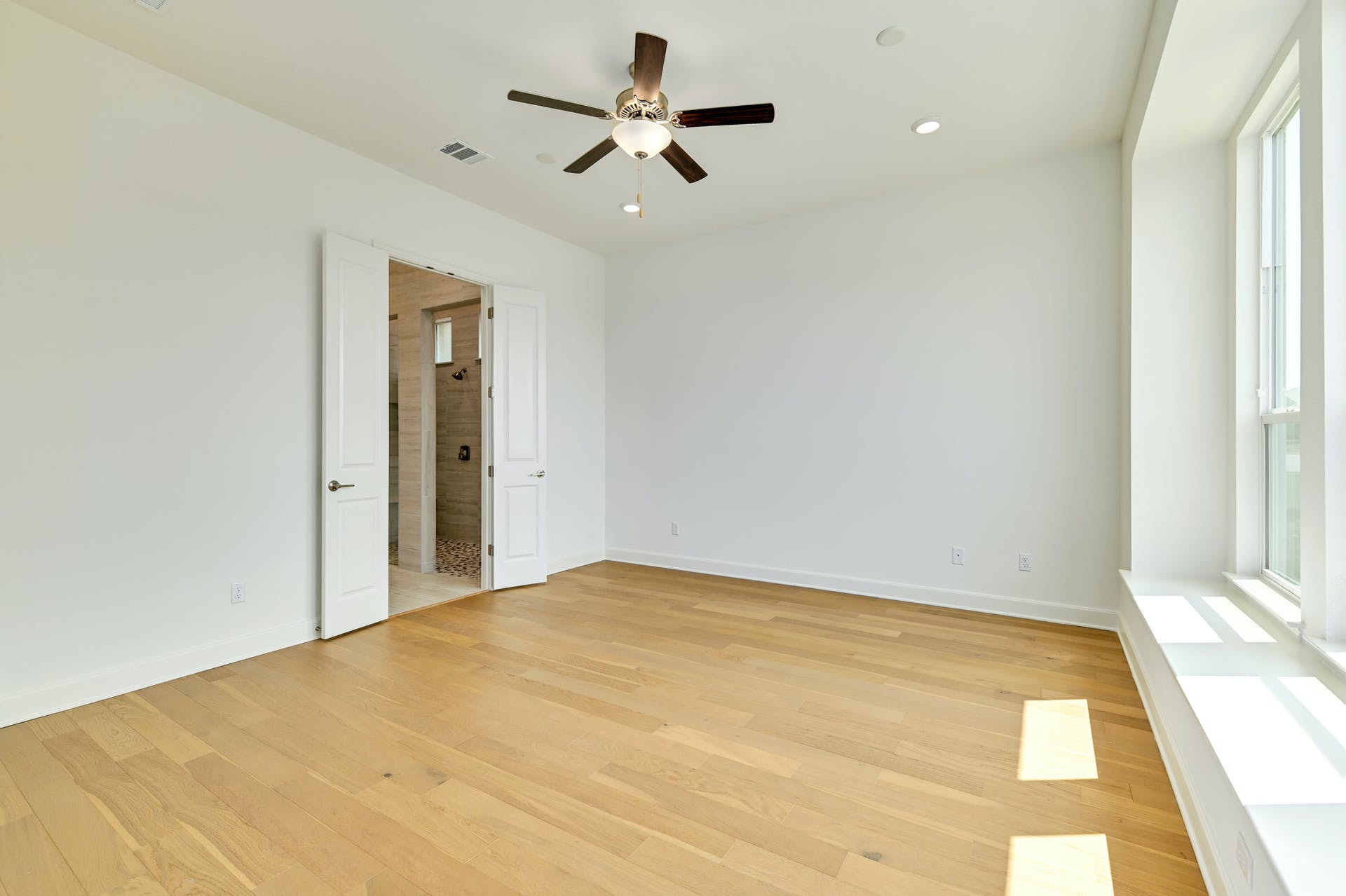 19005 Fernando Trail Austin, TX 78738 - Photo 18 of 35 Empty room with light wood finished floors, a ceiling fan, and recessed lighting