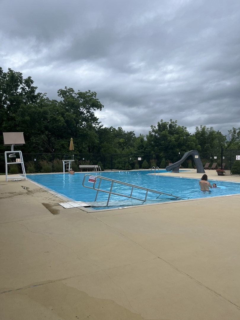 28 Cedar Lane Putnam, IL 61560 - Photo 5 of 9 a view of a swimming pool and a yard
