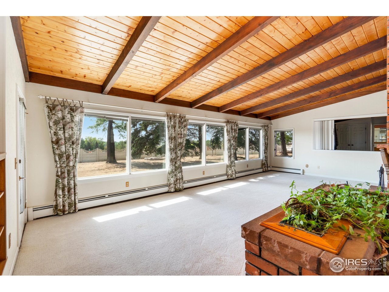 2115 Lindenmeier Road Fort Collins, CO 80524 - Photo 16 of 28 a living room with furniture