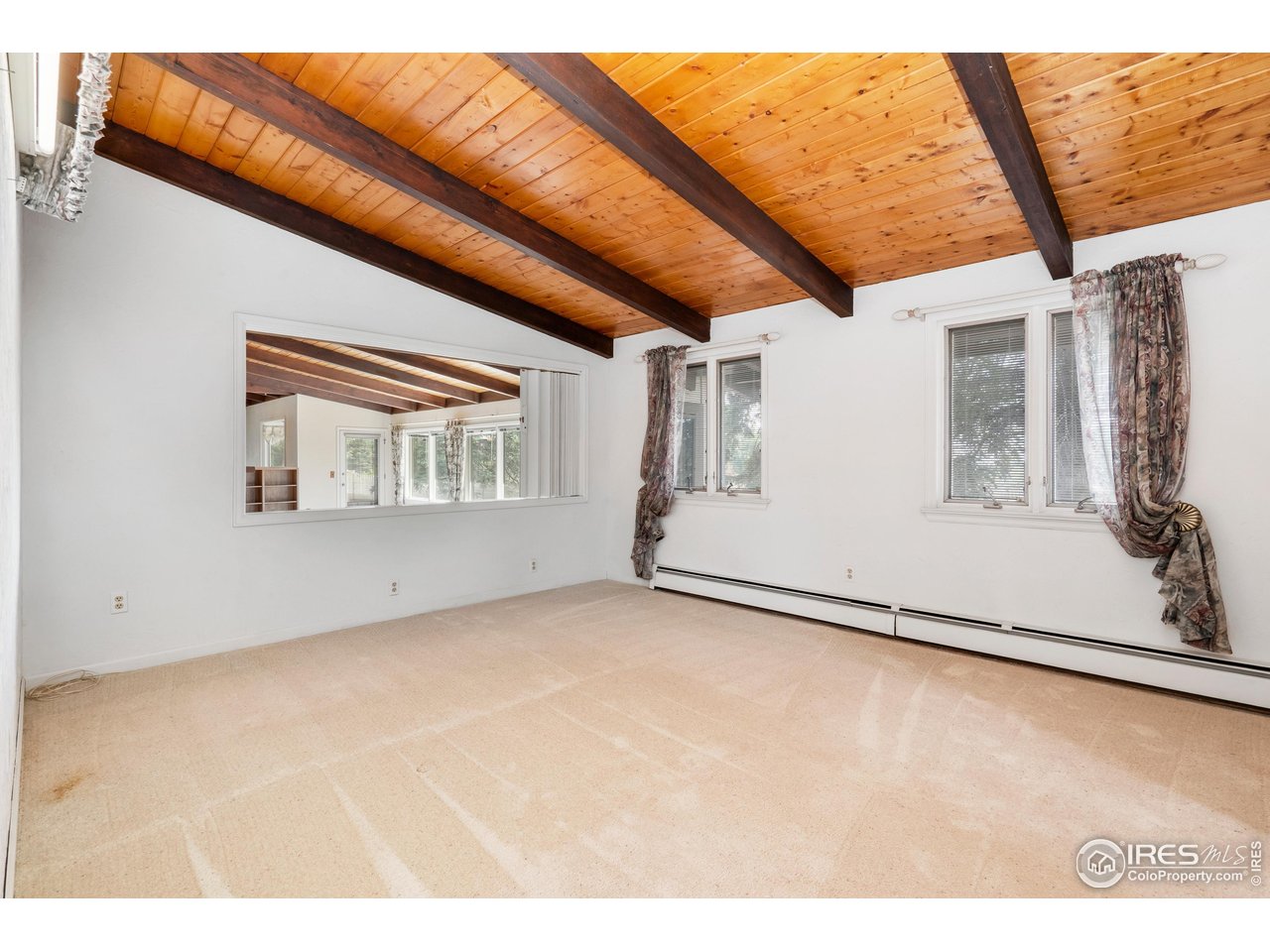 2115 Lindenmeier Road Fort Collins, CO 80524 - Photo 19 of 28 a view of an empty room with a window