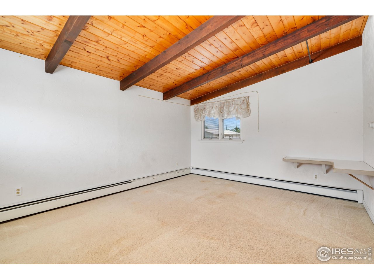2115 Lindenmeier Road Fort Collins, CO 80524 - Photo 23 of 28 a view of a room with racks on the wall