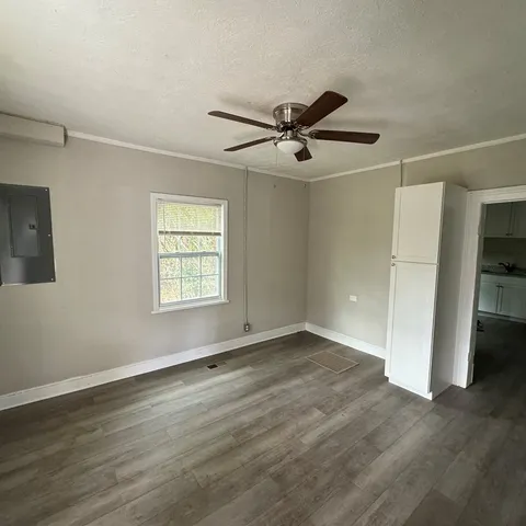 a view of an empty room with a window