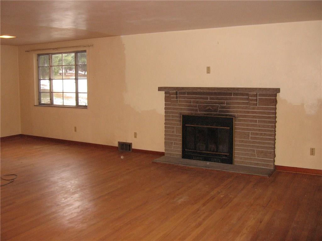 1586 Bellmonte Road Franklin Park, PA 15237 - Photo 3 of 15 Living room with fireplace.